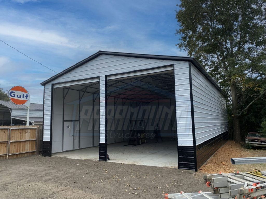 A white and black garage with two doors.