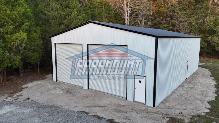 A white building with doors.