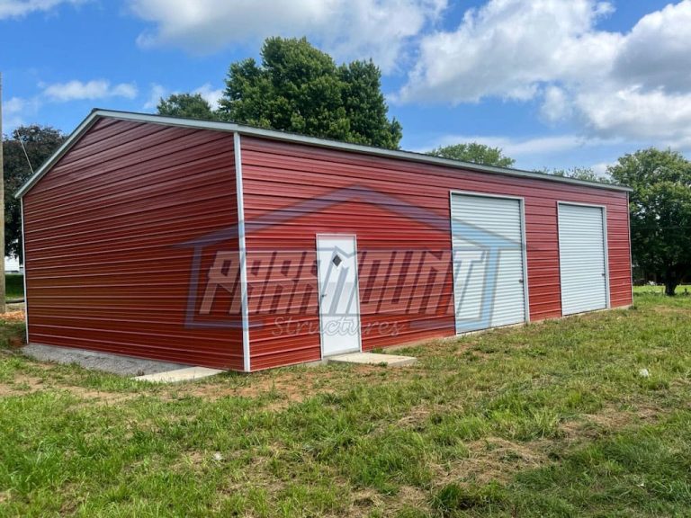 Red metal garage with two doors.